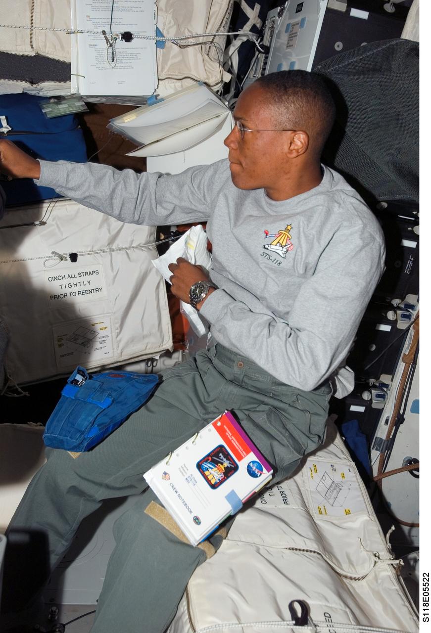 S118-E-05522 (9 Aug. 2007) --- Astronaut Alvin Drew, STS-118 mission specialist, works on the middeck of Space Shuttle Endeavour during flight day two activities.