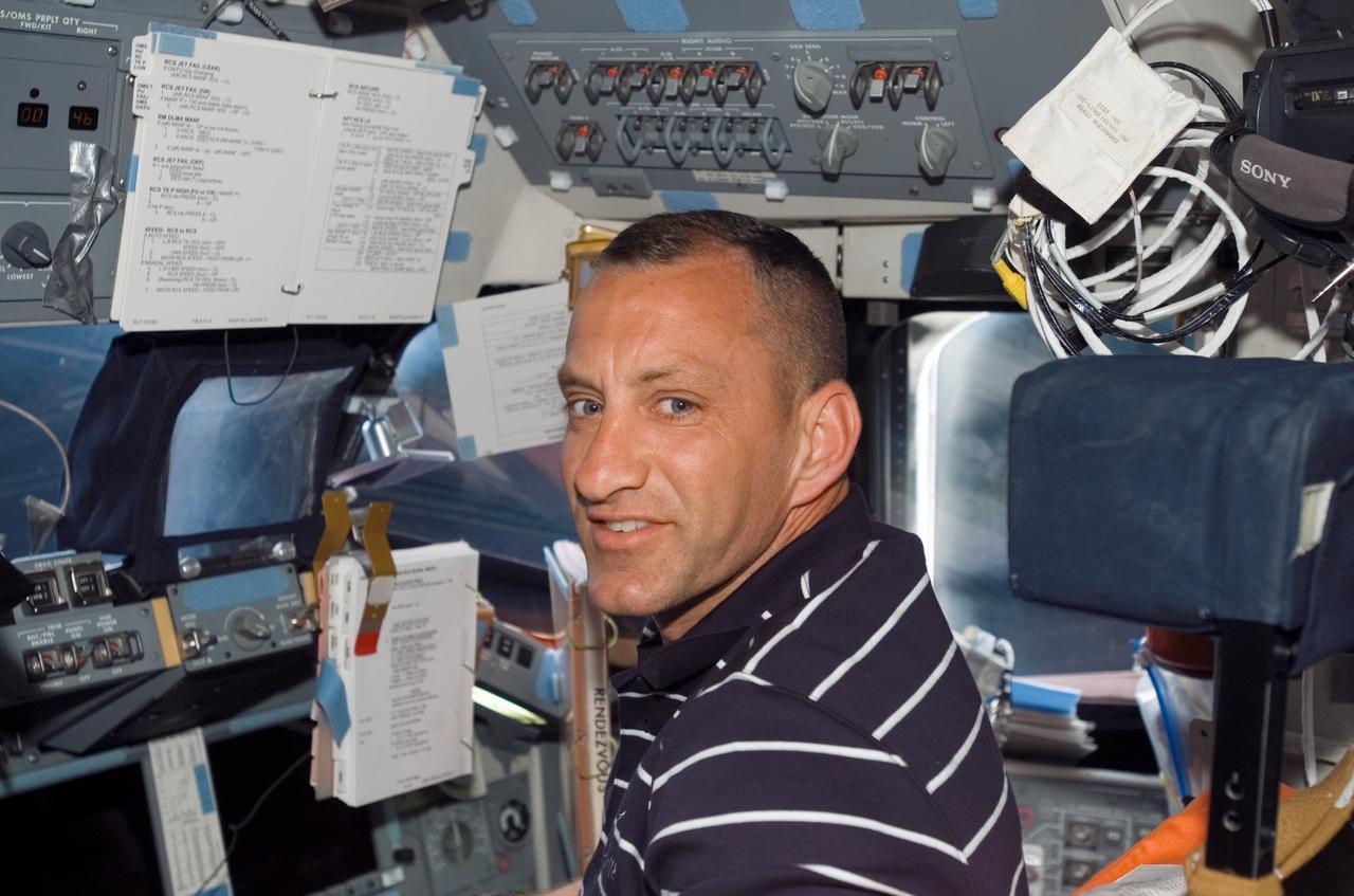 S118-E-05584 (9 Aug. 2007) --- Astronaut Charlie Hobaugh, STS-118 pilot, photographed on the flight deck of Space Shuttle Endeavour during flight day two activities.
