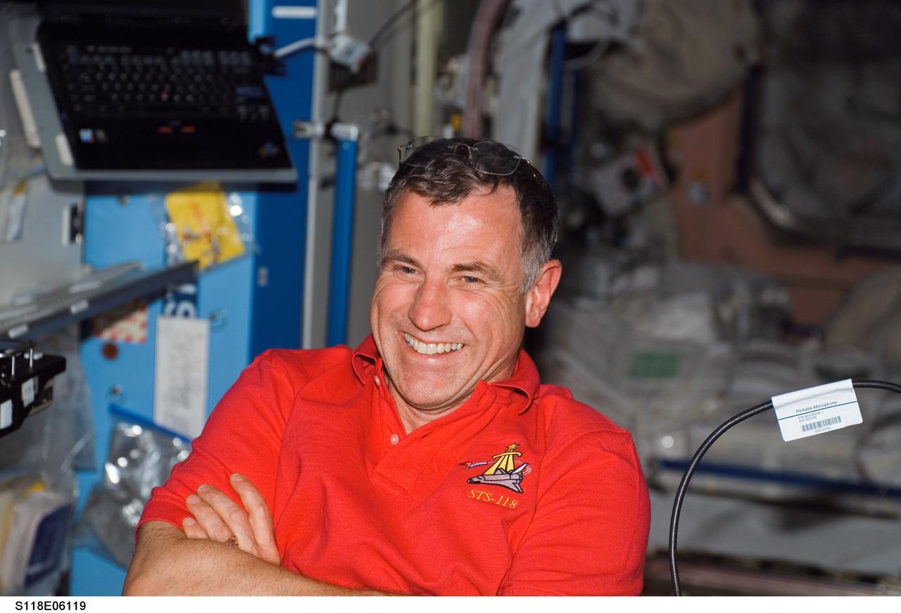 S118-E-06119 (10 Aug. 2007) --- Astronaut Dave Williams, STS-118 mission specialist representing the Canadian Space Agency, is photographed in the Destiny laboratory of the International Space Station following the docking with the Space Shuttle Endeavour.
