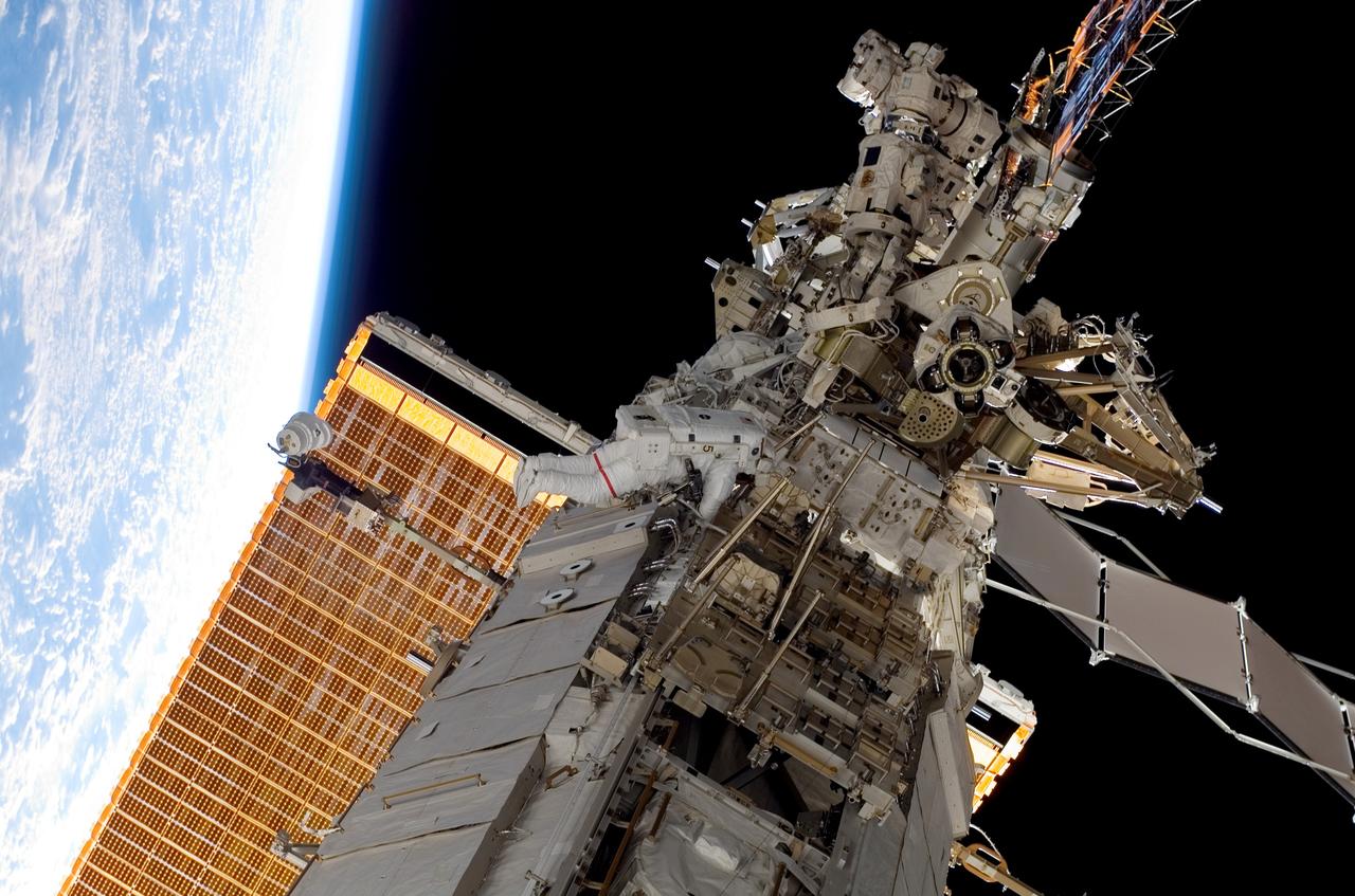 S118-E-06135 (11 Aug. 2007) --- Astronauts Rick Mastracchio and Canadian Space Agency's Dave Williams (out of frame), both STS-118 mission specialists, participate in the mission's first planned session of extravehicular activity (EVA), as construction continues on the International Space Station. During the 6-hour, 17-minute spacewalk Mastracchio and Williams attached the Starboard 5 (S5) segment of the station's truss, retracted the forward heat-rejecting radiator from the station's Port 6 (P6) truss, and performed several get-ahead tasks.