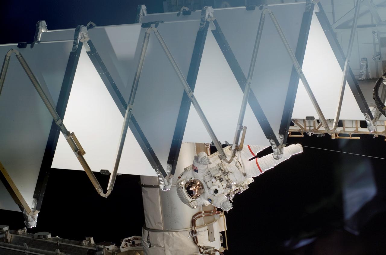 S118-E-06309 (11 Aug. 2007) --- Astronauts Rick Mastracchio and Canadian Space Agency's Dave Williams (out of frame), both STS-118 mission specialists, participate in the mission's first planned session of extravehicular activity (EVA), as construction continues on the International Space Station. During the 6-hour, 17-minute spacewalk Mastracchio and Williams attached the Starboard 5 (S5) segment of the station's truss, retracted the forward heat-rejecting radiator from the station's Port 6 (P6) truss, and performed several get-ahead tasks.