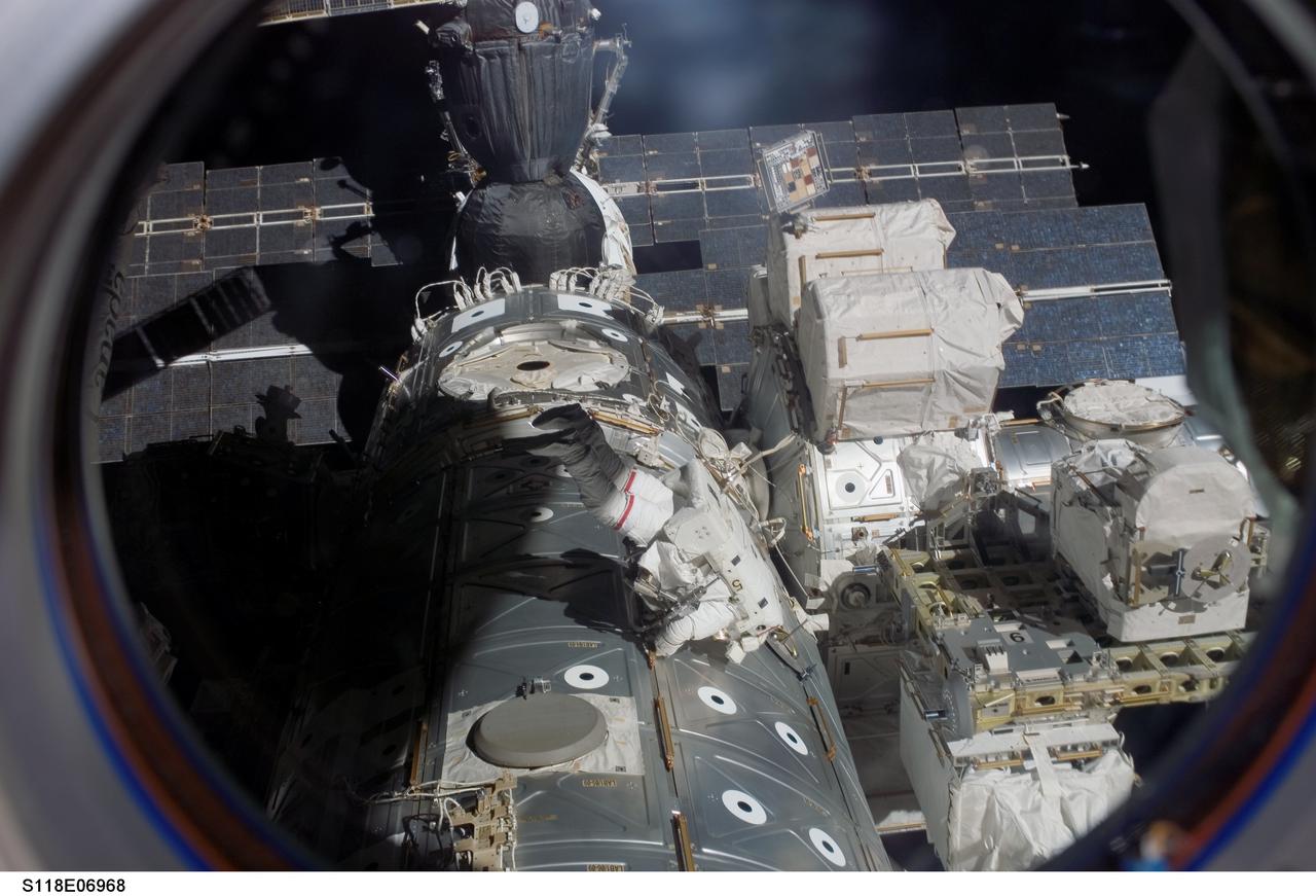 S118-E-06968 (13 Aug. 2007) --- Astronaut Rick Mastracchio, STS-118 mission specialist, participates in the mission's second planned session of extravehicular activity (EVA) as construction and maintenance continue on the International Space Station. During the 6-hour, 28-minute spacewalk, Mastracchio and astronaut Dave Williams (out of frame), mission specialist representing the Canadian Space Agency, removed a faulty control moment gyroscope (CMG-3) and installed a new CMG into the station's Z1 truss. The failed CMG will remain at its temporary stowage location on the station's exterior until it is returned to Earth on a later shuttle mission. The new gyroscope is one of four CMGs that are used to control the station's attitude in orbit.