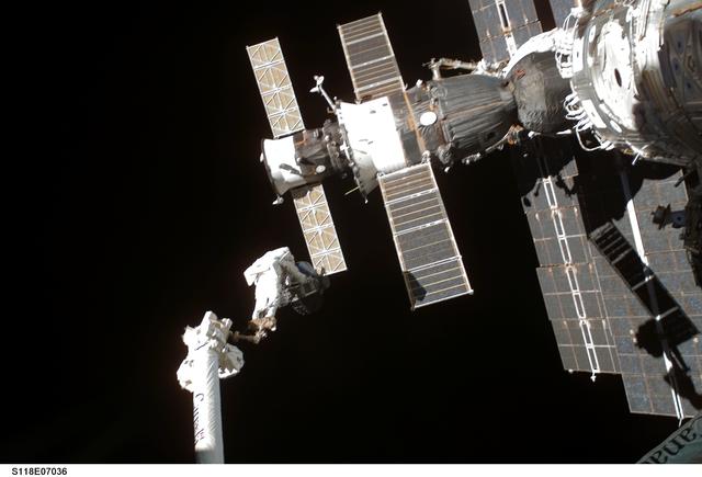 NASA image: View of MS Williams transporting the new CMG to the Z1 Truss during EVA 2