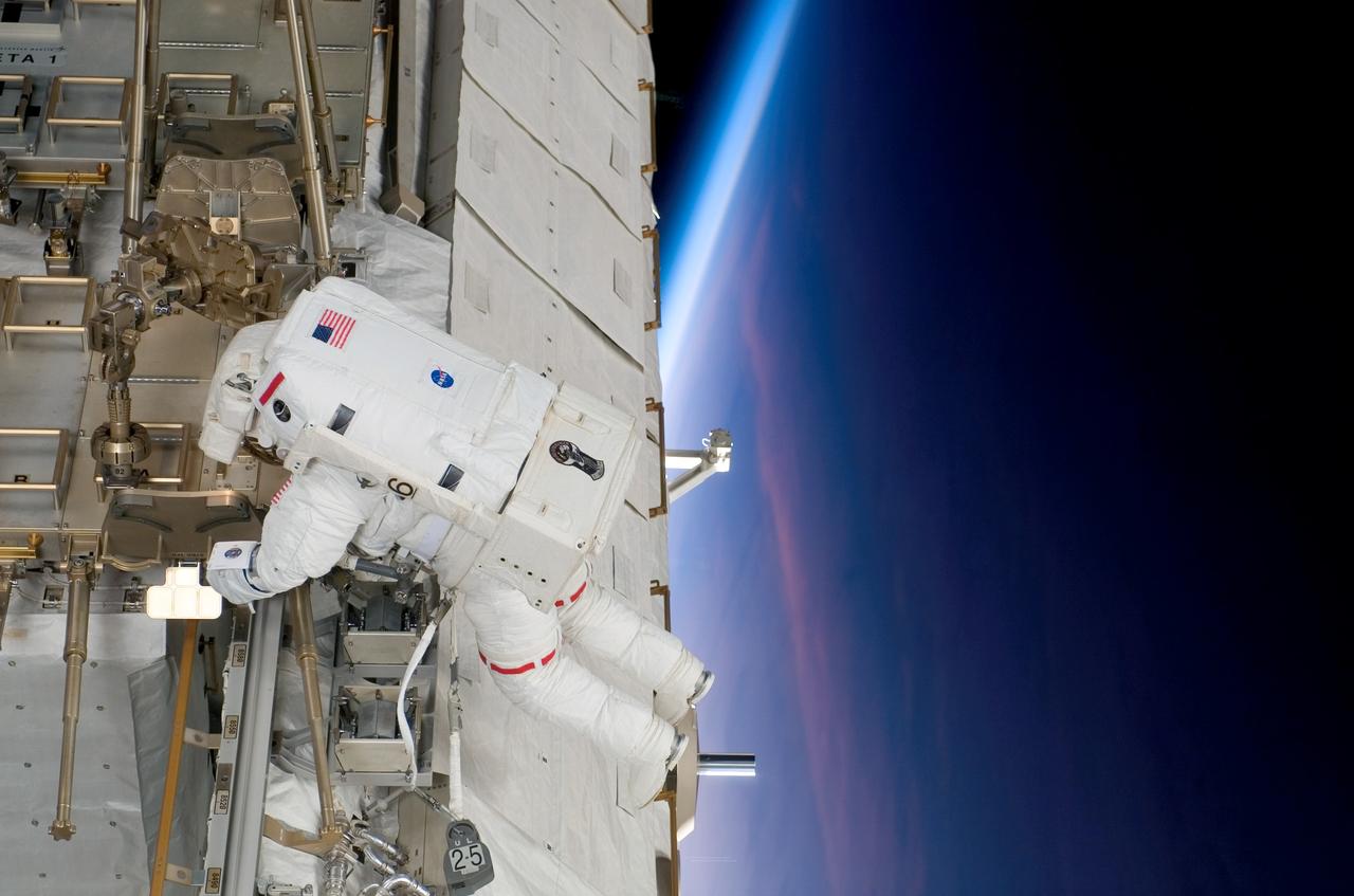 S118-E-07966 (15 Aug. 2007) --- Astronaut Clay Anderson, Expedition 15 flight engineer, participates in the mission's third planned session of extravehicular activity (EVA) as construction and maintenance continue on the International Space Station. During the 5-hour, 28-minute spacewalk, Anderson and astronaut Rick Mastracchio (out of frame), STS-118 mission specialist, relocated the S-Band Antenna Sub-Assembly from Port 6 (P6) to Port 1 (P1) truss, installed a new transponder on P1 and retrieved the P6 transponder. The blackness of space and Earth's horizon provide the backdrop for the scene.