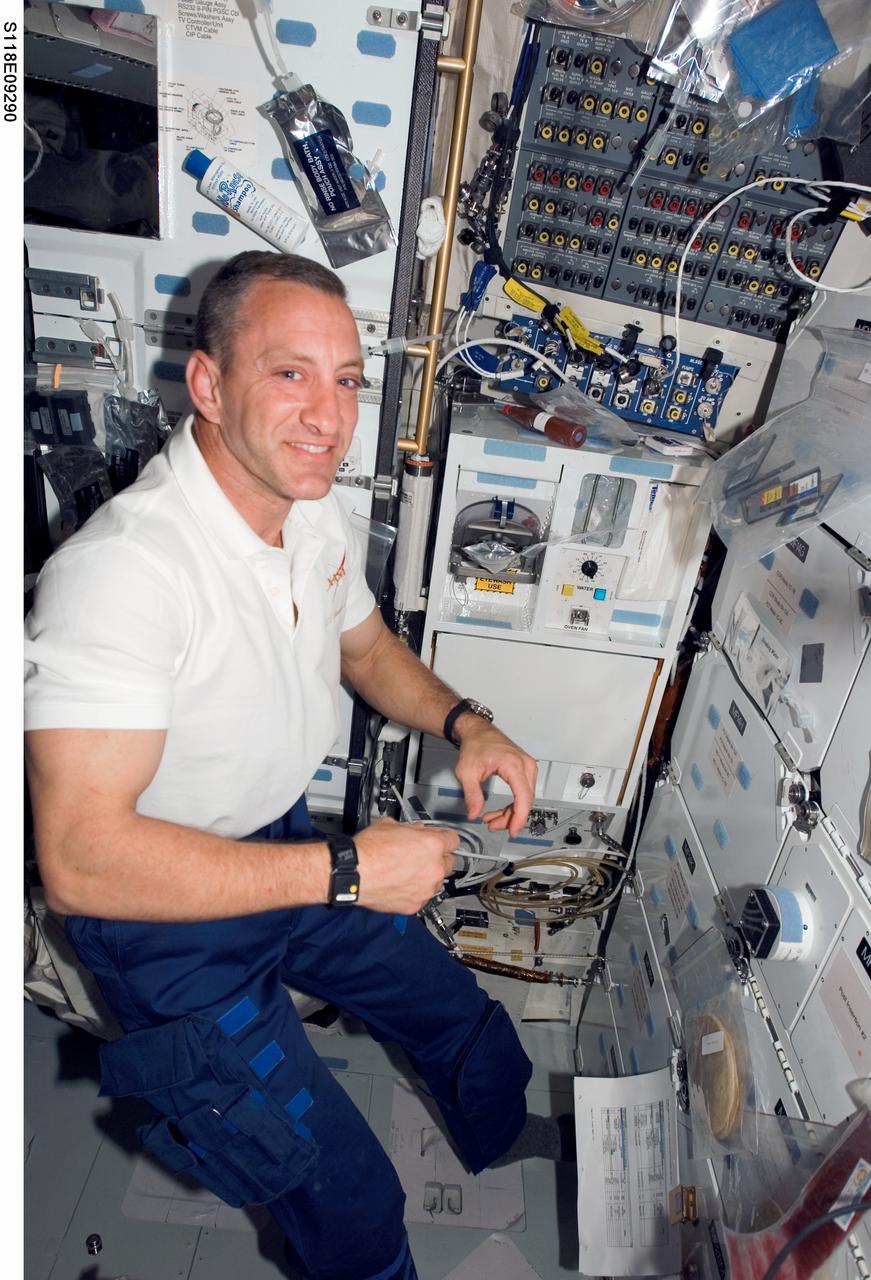 S118-E-09290 (18 Aug. 2007) --- Astronaut Charlie Hobaugh, STS-118 pilot, is photographed on the middeck of Space Shuttle Endeavour as the crew makes preparations for their return home. Hatches were closed between the International Space Station and Endeavour at 4:10 p.m. on Aug. 18.