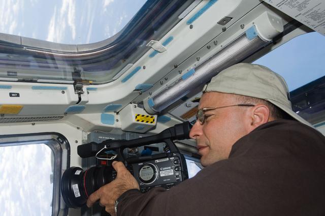 NASA image: Archambault with video camera on Flight Deck (FD)