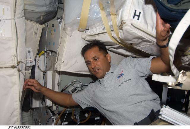 NASA image: Acaba on Middeck (MDDK) with Stowage Containers