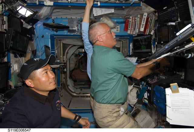 NASA image: Crew at Robotics Workstation (RWS) for SSRMS OPS