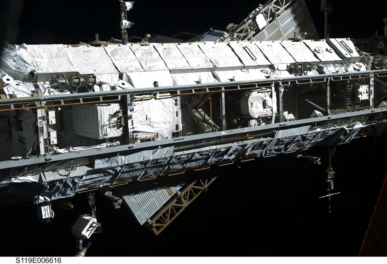 S119-E-006616 (18 March 2009) --- The International Space Station’s starboard truss is featured in this image photographed by a STS-119 crewmember while Space Shuttle Discovery is docked with the station.