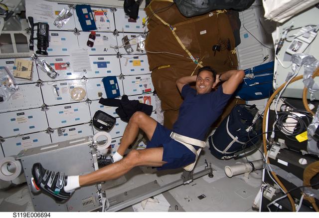 NASA image: Acaba on Mid Deck (MDDK) with Cycle Ergometer with Vibration Isolation System (CEVIS)