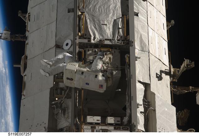 NASA image: STS-119 Extravehicular Activity (EVA) 3 Crew and Equipment Translation Aid (CETA) Cart 2 Relocate OPS