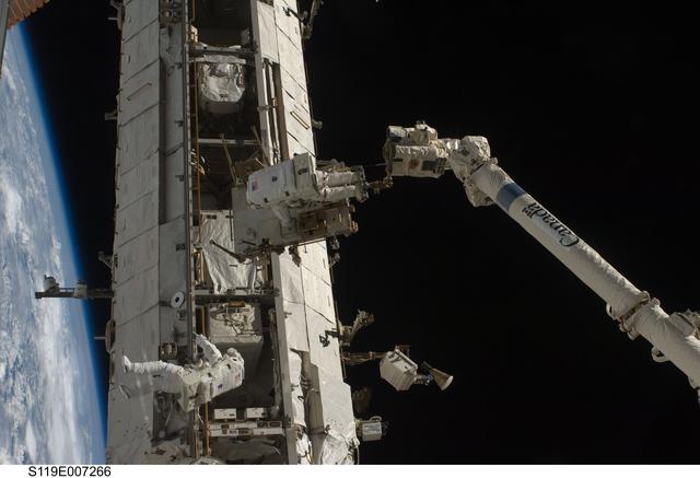 NASA image: STS-119 Extravehicular Activity (EVA) 3 Crew and Equipment Translation Aid (CETA) Cart 2 Relocate OPS
