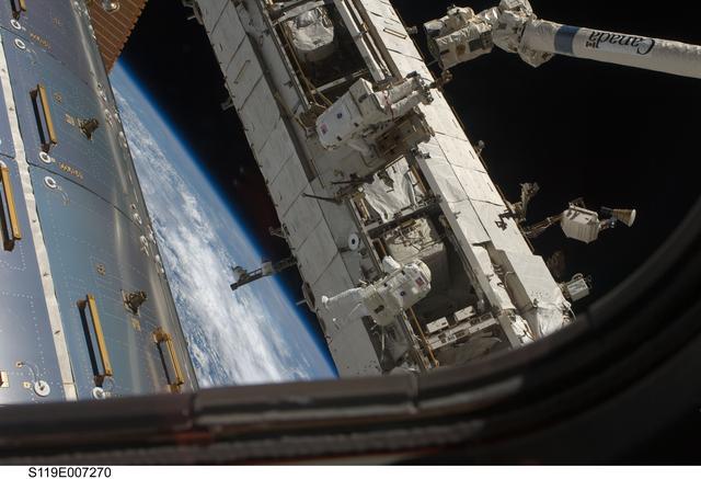 NASA image: STS-119 Extravehicular Activity (EVA) 3 Crew and Equipment Translation Aid (CETA) Cart 2 Relocate OPS