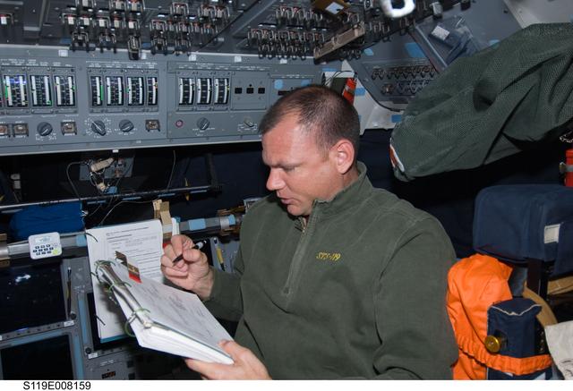 NASA image: Antonelli reviews undocking procedures on Flight Deck