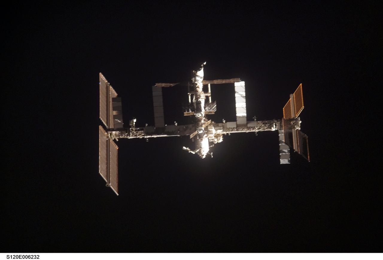 S120-E-006232 (25 Oct. 2007) ---  The International Space Station is featured in this image photographed by a STS-120 crewmember as Space Shuttle Discovery approaches the station during rendezvous and docking activities on flight day three. Docking occurred at 7:40 a.m. (CDT) on Oct. 25, 2007, as the two spacecraft flew over the Atlantic Ocean just off the coast of North Carolina.