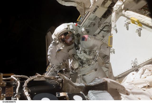NASA image: EVA 1 - Parazynski in Discovery payload bay
