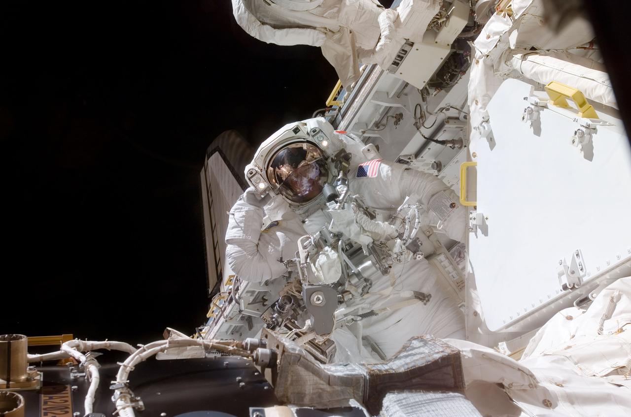S120-E-006876 (26 Oct. 2007) --- Astronaut Scott Parazynski, STS-120 mission specialist, is pictured in the shutte's cargo bay during the first of five scheduled sessions of extravehicular activity to perform work on the International Space Station while it is visited by the Space Shuttle Discovery. Node 2, also known as Harmony, joined the growing station complex, thanks to the work of the two spacewalkers in conjunction with that of their crewmates who remained in the shirt sleeve environment of the two spacecraft.