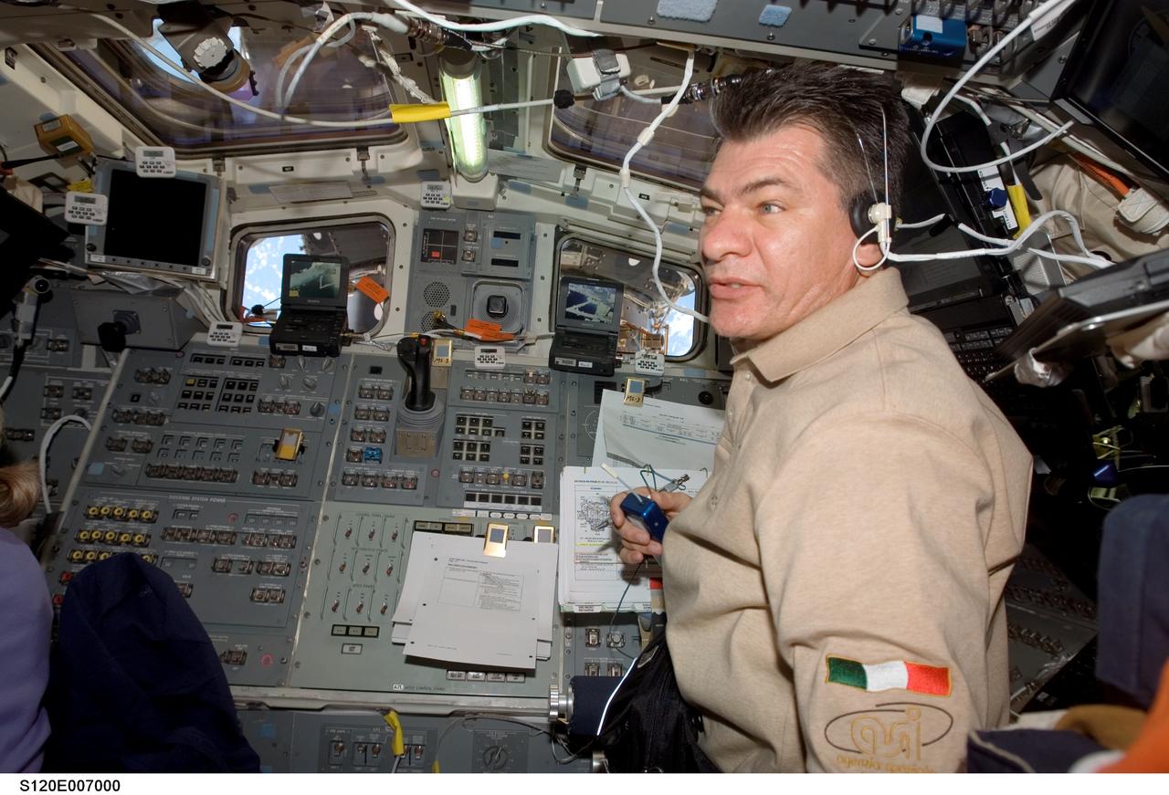 S120-E-007000 (28 Oct. 2007) --- European Space Agency (ESA) astronaut Paolo Nespoli, STS-120 mission specialist, works on the aft flight deck of Space Shuttle Discovery while docked with the International Space Station.