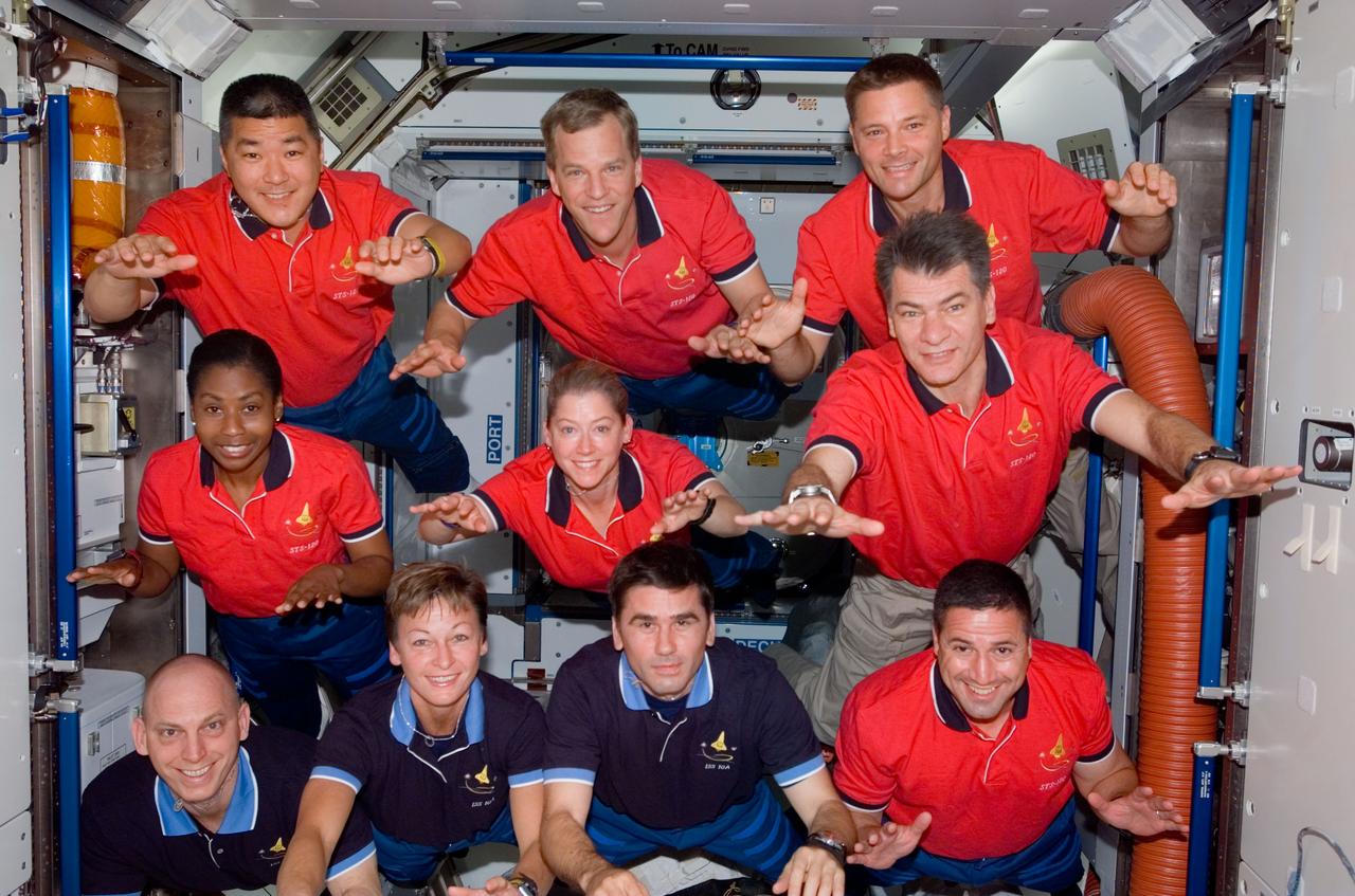 S120-E-007608 (31 Oct. 2007) --- STS-120 and Expedition 16 crewmembers pose for a group photo following a joint news conference in the Harmony node of the International Space Station while Space Shuttle Discovery is docked with the station. From the left (bottom) are astronauts Clayton Anderson, STS-120 mission specialist; Peggy A. Whitson, Expedition 16 commander; cosmonaut Yuri I. Malenchenko, Expedition 16 flight engineer representing Russia's Federal Space Agency; and George Zamka, STS-120 pilot. From the left (center) are astronauts Stephanie Wilson, STS-120 mission specialist; Pam Melroy, STS-120 commander; and Paolo Nespoli, mission specialist representing the European Space Agency (ESA). From the left (top) are astronauts Daniel Tani, Expedition 16 flight engineer; Scott Parazynski and Doug Wheelock, both STS-120 mission specialists.