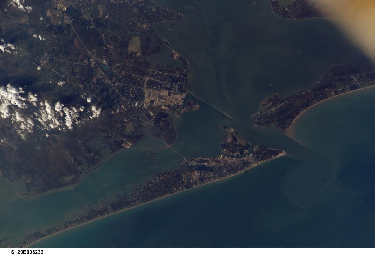 S120-E-008232 (2 Nov. 2007) --- Galveston Island, part of Galveston Bay and the Texas City area, not far from the Johnson Space Center (out of frame), are featured in this picture taken by a crewmember while the Space Shuttle Discovery was docked with the International Space Station. The Texas City Dike is near frame center.