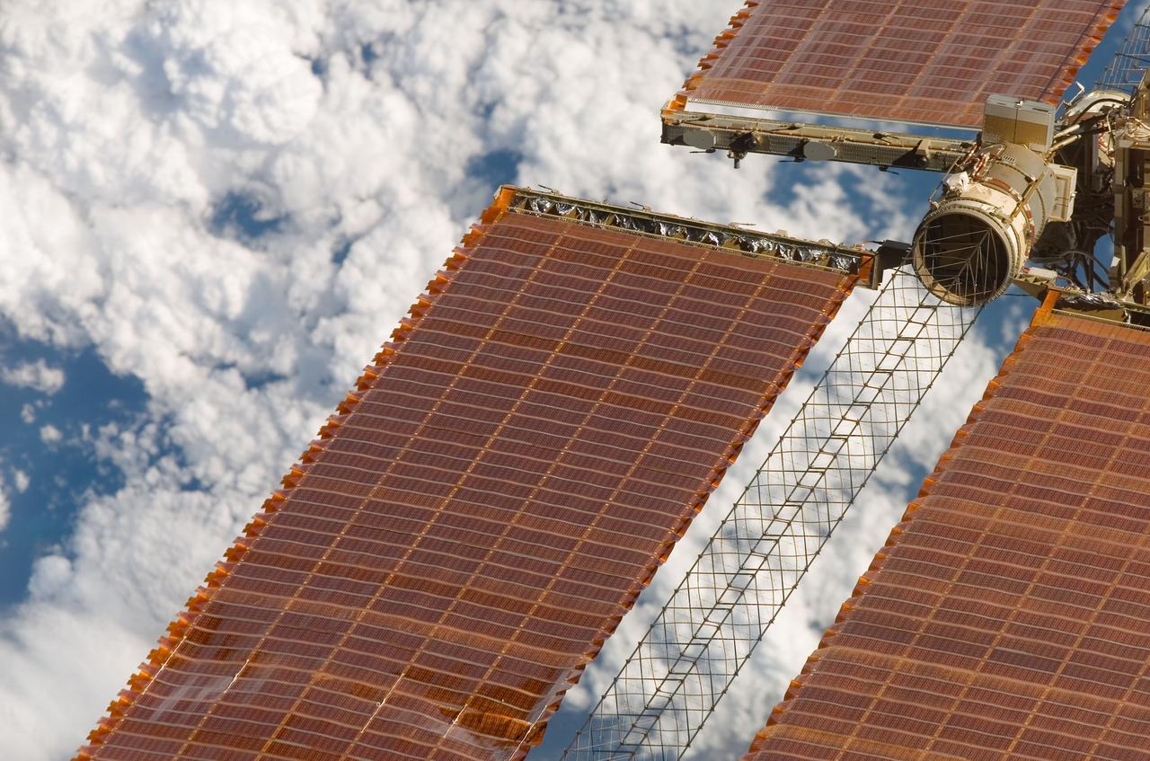 S120-E-008602 (5 Nov. 2007) --- A repaired solar array is featured in this image photographed by a STS-120 crewmember onboard the Space Shuttle Discovery as it moves away from the International Space Station. Undocking of the two spacecraft occurred at 4:32 a.m. (CST) on Nov. 5, 2007.