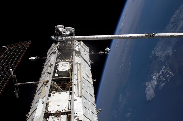 NASA image: Fossum and Sellers on the P1 Truss during EVA1 on STS-121 / Expedition 13 joint operations