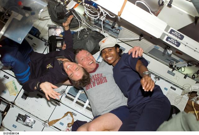 NASA image: Group shot of Nowak,Fossum and Wilson on the MDK during STS-121 / Expedition 13 joint operations