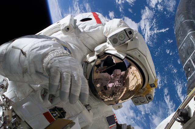 NASA image: Mid-shot of Seller on EVA3 during STS-121 / Expedition 13 joint operations