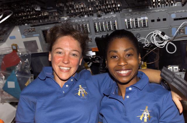 NASA image: Two-shot of Nowak and Wison on the FD during STS-121 / Expedition 13 joint operations