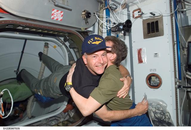 NASA image: Whitson greets Poindexter after Hatch Opening