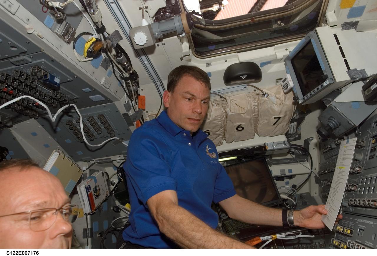 S122-E-007176 (9 Feb. 2008) --- Astronaut Stanley Love, STS-122 mission specialist, works on the aft flight deck of Space Shuttle Atlantis during flight day three activities.