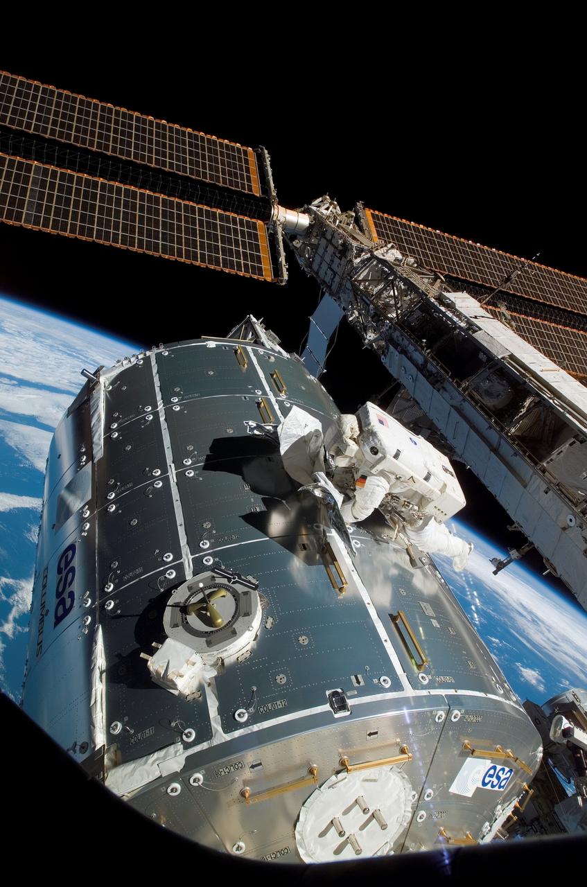 S122-E-008222 (13 Feb. 2008) --- European Space Agency (ESA) astronaut Hans Schlegel, STS-122 mission specialist, works on the new Columbus laboratory as he participates in the mission's second scheduled session of extravehicular activity (EVA) as construction and maintenance continue on the International Space Station. During the six-hour, 45-minute spacewalk, among other tasks, Schlegel and NASA astronaut Rex Walheim (out of frame), mission specialist, worked to replace a nitrogen tank used to pressurize the station's ammonia cooling system.