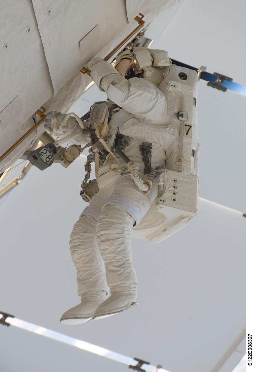 S122-E-008327 (13 Feb. 2008) --- European Space Agency (ESA) astronaut Hans Schlegel, STS-122 mission specialist, participates in the mission's second scheduled session of extravehicular activity (EVA) as construction and maintenance continue on the International Space Station. During the six-hour, 45-minute spacewalk, among other tasks, Schlegel and NASA astronaut Rex Walheim (out of frame), mission specialist, worked to replace a nitrogen tank used to pressurize the station's ammonia cooling system.