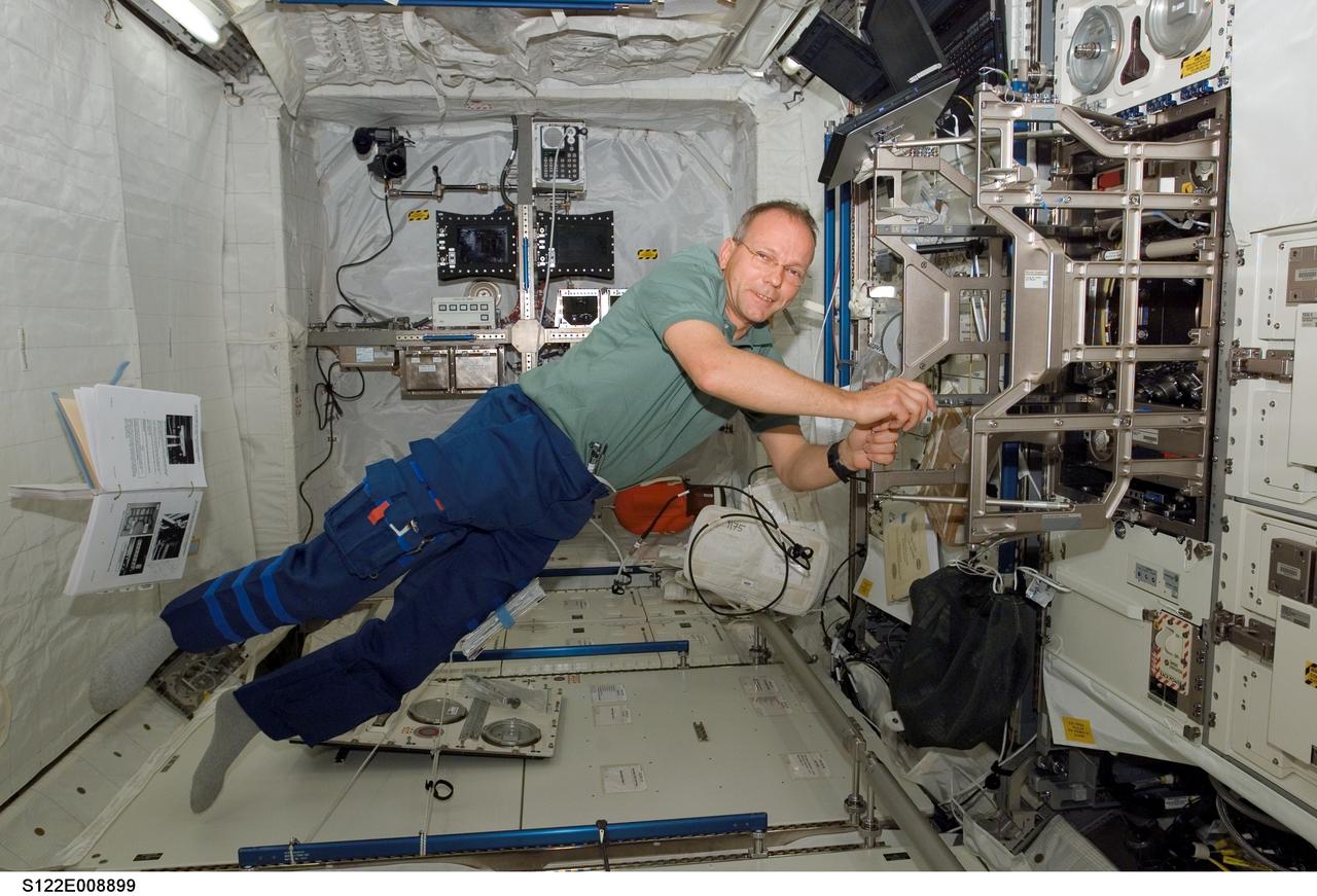 S122-E-008899 (15 Feb. 2008) --- European Space Agency astronaut Hans Schlegel, STS-122 mission specialist, continues work aimed toward readying the agency's new Columbus laboratory for duty aboard the International Space Station.