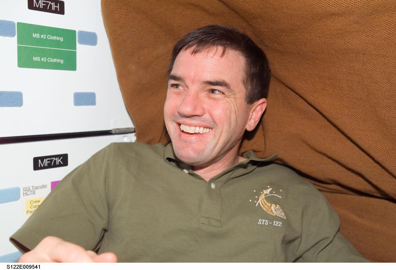 S122-E-009541 (16 Feb. 2008) --- Astronaut Rex Walheim, STS-122 mission specialist, is pictured on the middeck of Space Shuttle Atlantis while docked with the International Space Station.