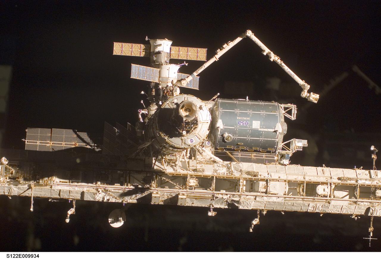 S122-E-009934 (18 Feb. 2008) --- A close-up view of the Columbus laboratory (center right) -- newest addition to the International Space Station -- is featured in this image photographed by a STS-122 crewmember on Space Shuttle Atlantis shortly after the undocking of the two spacecraft.