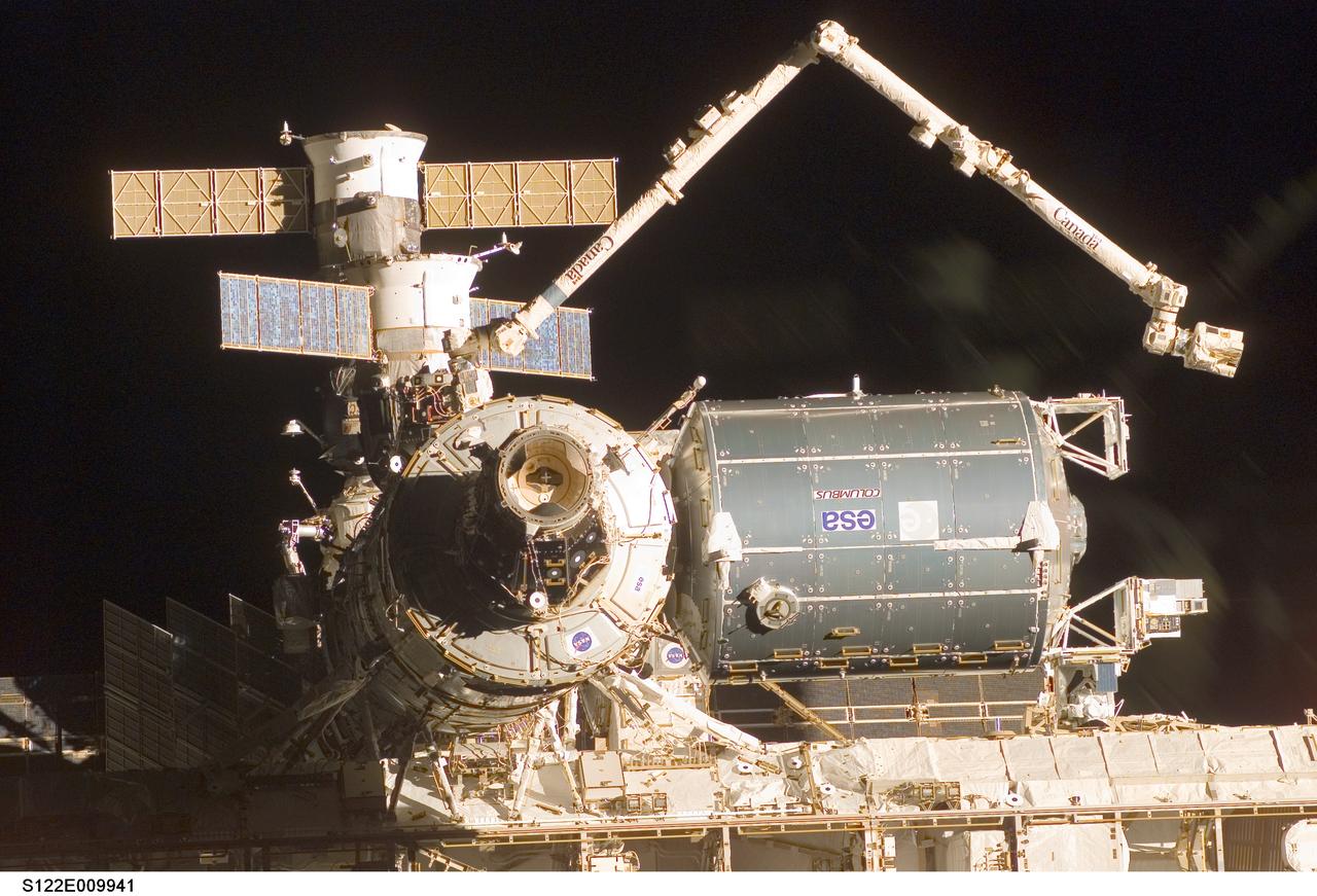 S122-E-009941 (18 Feb. 2008) --- A close-up view of the Columbus laboratory (center right) -- newest addition to the International Space Station -- is featured in this image photographed by a STS-122 crewmember on Space Shuttle Atlantis shortly after the undocking of the two spacecraft.