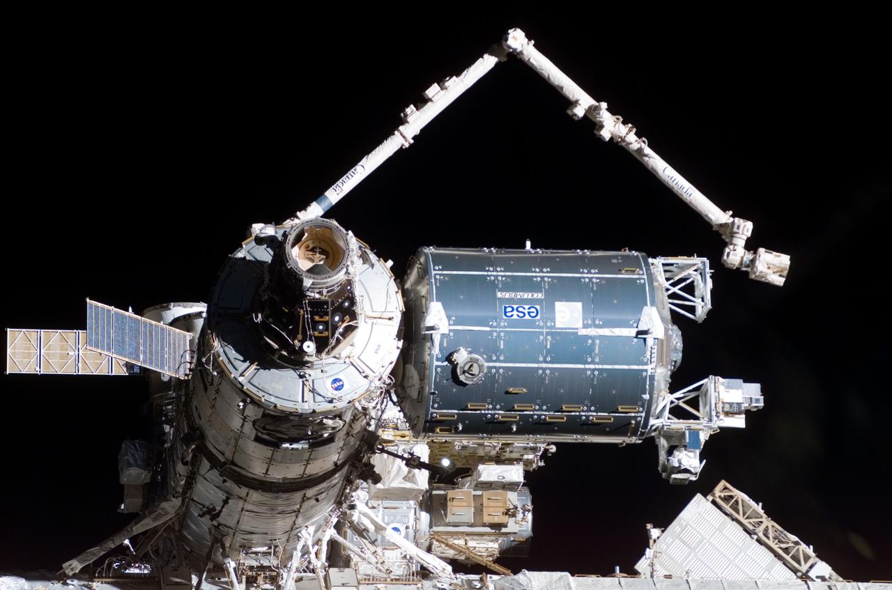 S122-E-009954 (18 Feb. 2008) --- A close-up view of the Columbus laboratory (center right) -- newest addition to the International Space Station -- is featured in this image photographed by a STS-122 crewmember on Space Shuttle Atlantis shortly after the undocking of the two spacecraft.