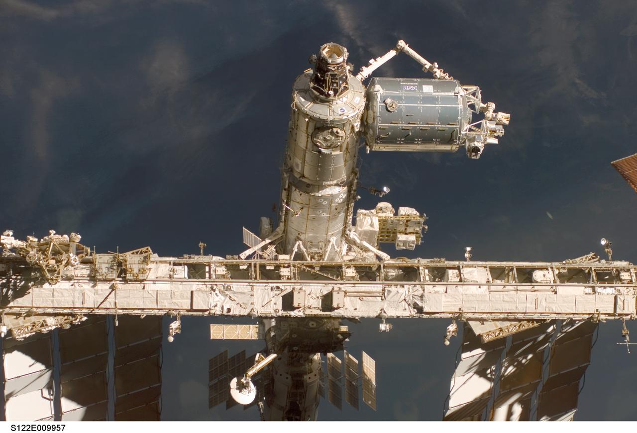 S122-E-009957 (18 Feb. 2008) --- A close-up view of the Columbus laboratory (top right) -- newest addition to the International Space Station -- is featured in this image photographed by a STS-122 crewmember on Space Shuttle Atlantis shortly after the undocking of the two spacecraft.