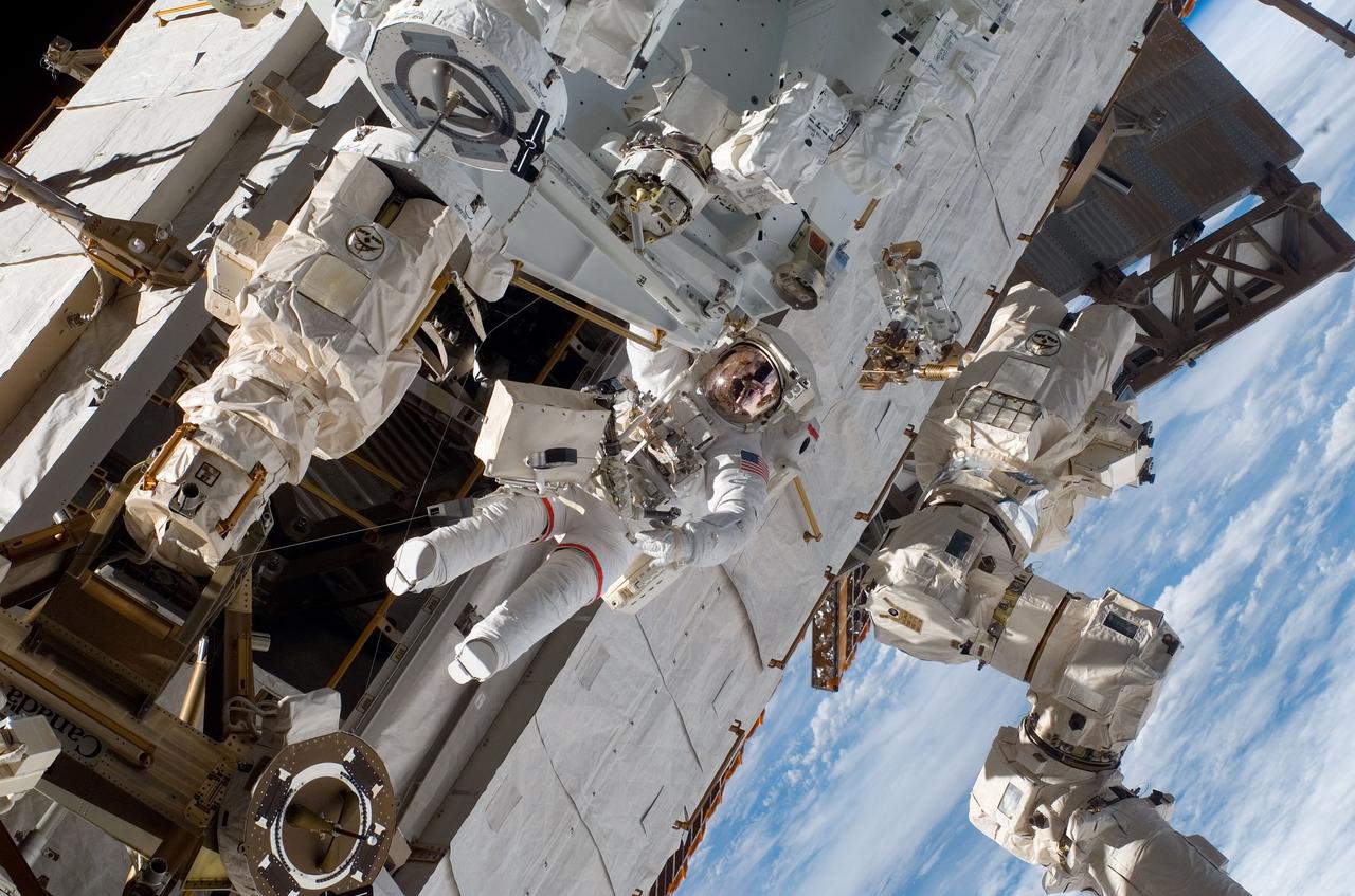 S123-E-006082 (13/14 March 2008) --- Astronaut Rick Linnehan, STS-123 mission specialist, participates in the mission's first scheduled session of extravehicular activity (EVA) as construction and maintenance continue on the International Space Station. During the seven-hour and one-minute spacewalk, Linnehan and astronaut Garrett Reisman (out of frame), Expedition 16 flight engineer, prepared the Japanese logistics module-pressurized section (JLP) for removal from Space Shuttle Endeavour's payload bay; opened the Centerline Berthing Camera System on top of the Harmony module; removed the Passive Common Berthing Mechanism and installed both the Orbital Replacement Unit (ORU) tool change out mechanisms on the Canadian-built Dextre robotic system, the final element of the station's Mobile Servicing System.