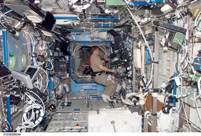 NASA image: STS-123 Crewmembers work at Robotic Controls during STS-123 / Expedition 16 Joint Operations