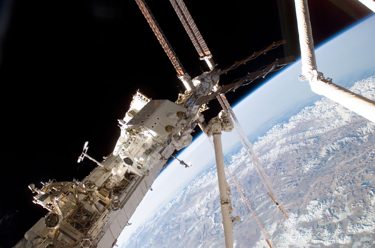 S123-E-006400 (15/16 March 2008) --- Astronauts Rick Linnehan and Mike Foreman, both STS-123 mission specialists, participate in the mission's second scheduled session of extravehicular activity (EVA) as construction and maintenance continue on the International Space Station. During the 7-hour, 8-minute spacewalk, Linnehan and Foreman, assembled the stick-figure-shaped Dextre, also known as the Special Purpose Dextrous Manipulator (SPDM), a task that included attaching its two arms. Designed for station maintenance and service, Dextre is capable of sensing forces and movement of objects it is manipulating. It can automatically compensate for those forces and movements to ensure an object is moved smoothly. Dextre is the final element of the station's Mobile Servicing System. The blackness of space and Earth's horizon provide the backdrop for the scene.