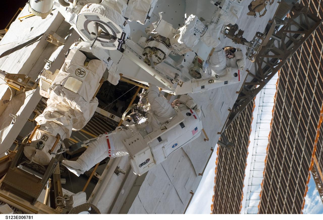 S123-E-006781 (15/16 March 2008) --- Astronauts Rick Linnehan (right) and Mike Foreman, both STS-123 mission specialists, participate in the mission's second scheduled session of extravehicular activity (EVA) as construction and maintenance continue on the International Space Station. During the 7-hour, 8-minute spacewalk, Linnehan and Foreman, assembled the stick-figure-shaped Dextre, also known as the Special Purpose Dextrous Manipulator (SPDM), a task that included attaching its two arms. Designed for station maintenance and service, Dextre is capable of sensing forces and movement of objects it is manipulating. It can automatically compensate for those forces and movements to ensure an object is moved smoothly. Dextre is the final element of the station's Mobile Servicing System.