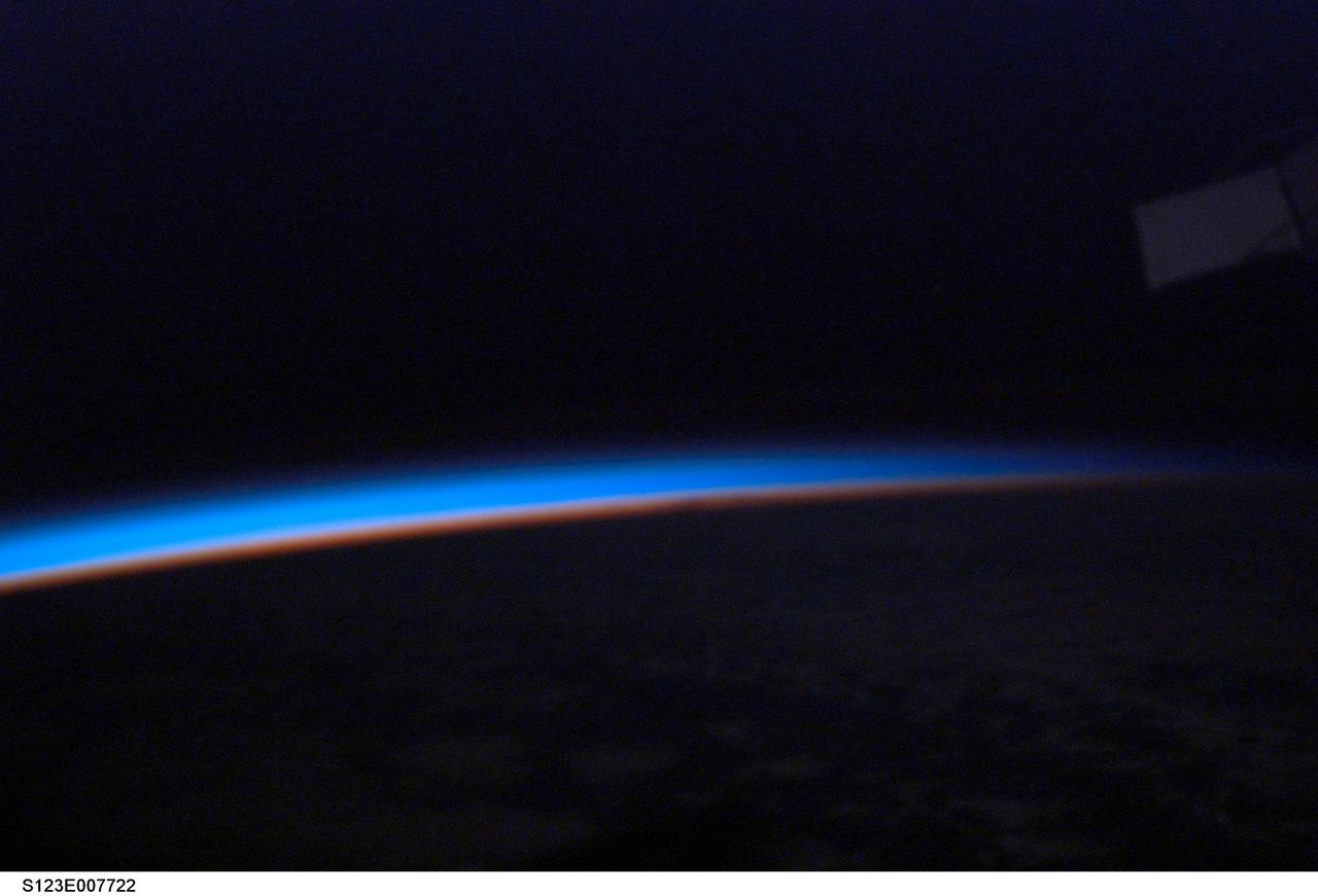 S123-E-007722 (20 March 2008) --- A colorful view of airglow layers at Earth's horizon is featured in this image photographed by a STS-123 crewmember on the Space Shuttle Endeavour while docked with the International Space Station.