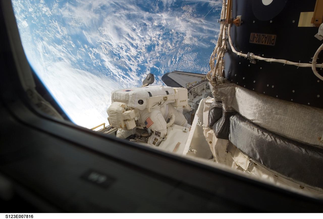 S123-E-007816 (21 March 2008) --- Astronaut Robert L. Behnken, STS-123 mission specialist, participates in the mission's fourth scheduled session of extravehicular activity (EVA) as construction and maintenance continue on the International Space Station. During the 6-hour, 24-minute spacewalk, Behnken and astronaut Mike Foreman (out of frame), mission specialist, replaced a failed Remote Power Control Module -- essentially a circuit breaker -- on the station's truss. The spacewalkers also tested a repair method for damaged heat resistant tiles on the space shuttle. This technique used a caulk-gun-like tool named the Tile Repair Ablator Dispenser to dispense a material called Shuttle Tile Ablator-54 into purposely damaged heat shield tiles. The sample tiles will be returned to Earth to undergo extensive testing on the ground.