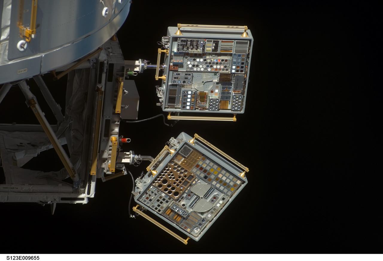 s123e009655 (3/25/2008) --- View of Materials International Space Station Experiment (MISSE) 6 Passive Experiment Container (PEC) on European Laboratory/Columbus. Photo was taken during flyaround of STS-123 Space Shuttle Endeavor.
