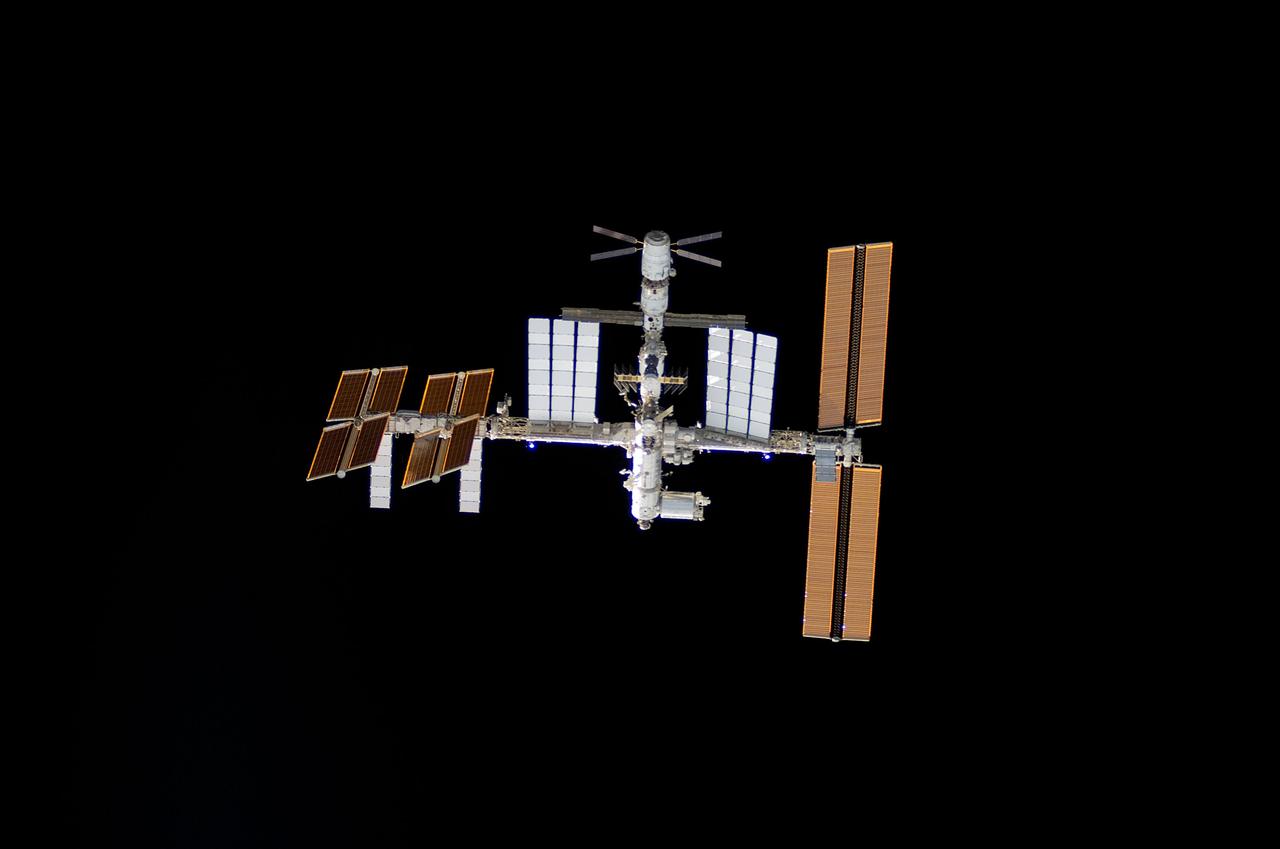 S124-E-005521 (2 June 2008) --- The International Space Station is centered in this image photographed by an STS-124 crewmember as Space Shuttle Discovery approaches the station during rendezvous and docking activities on flight day three. Docking occurred at 2:03 p.m. (EDT) on June 2, 2008.