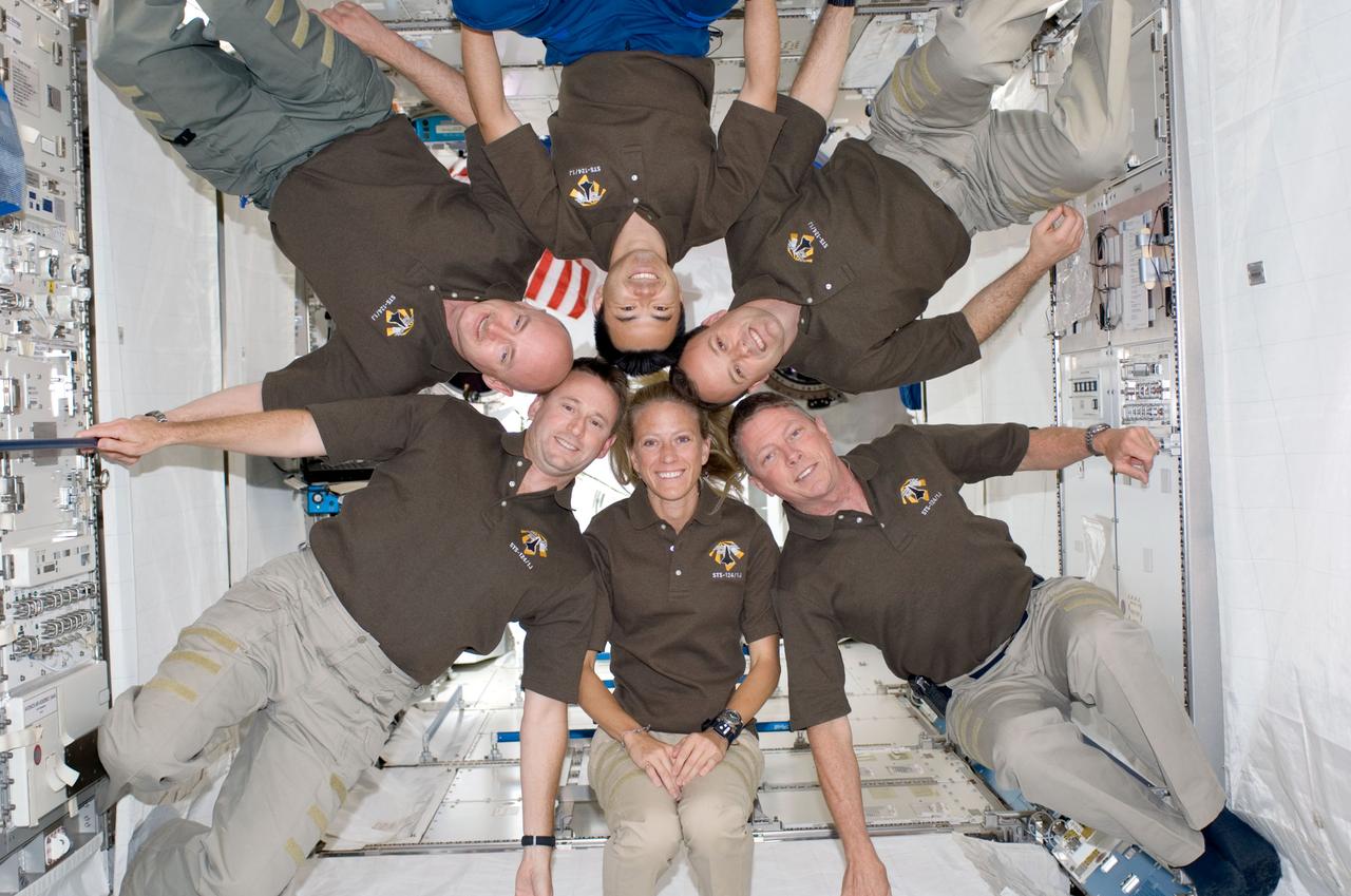 S124-E-007941 (9 June 2008) --- STS-124 crewmembers pose for a portrait following a joint news conference with the Expedition 17 crewmembers from the Kibo Japanese Pressurized Module of the International Space Station while Space Shuttle Discovery is docked with the station. Pictured (clockwise) from the bottom are NASA astronauts Karen Nyberg, mission specialists; Ken Ham, pilot; Mark Kelly, commander; Japan Aerospace Exploration Agency astronaut Akihiko Hoshide, NASA astronauts Ron Garan and Mike Fossum, all mission specialists.