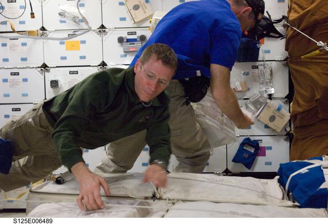NASA image: Johnson and Altman in the Shuttle Atlantis Middeck