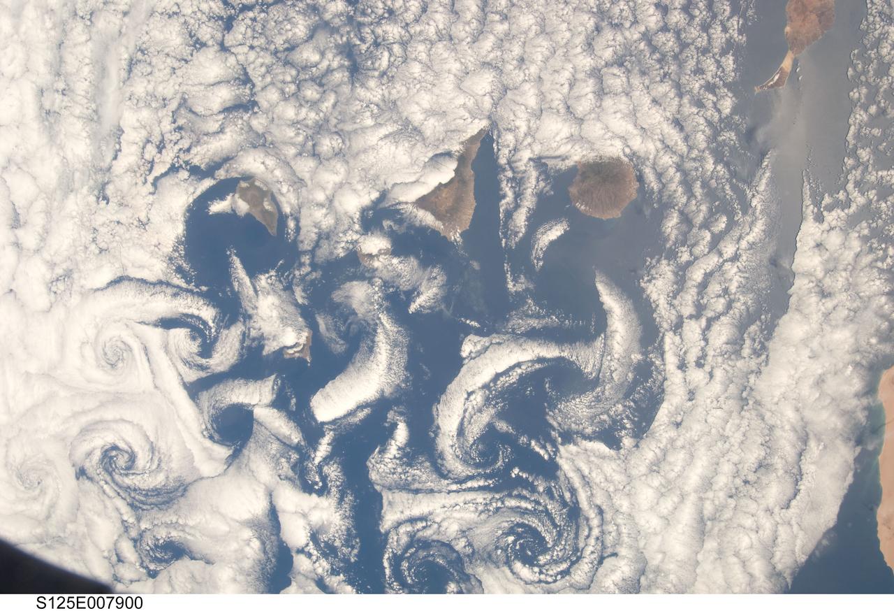 S125-E-007900 (16 May 2009) --- A nadir view of  cloud vortices in the area of the Canary Islands in the North Atlantic Ocean was recorded by one of the STS-125 crewmembers on a busy flight day six.